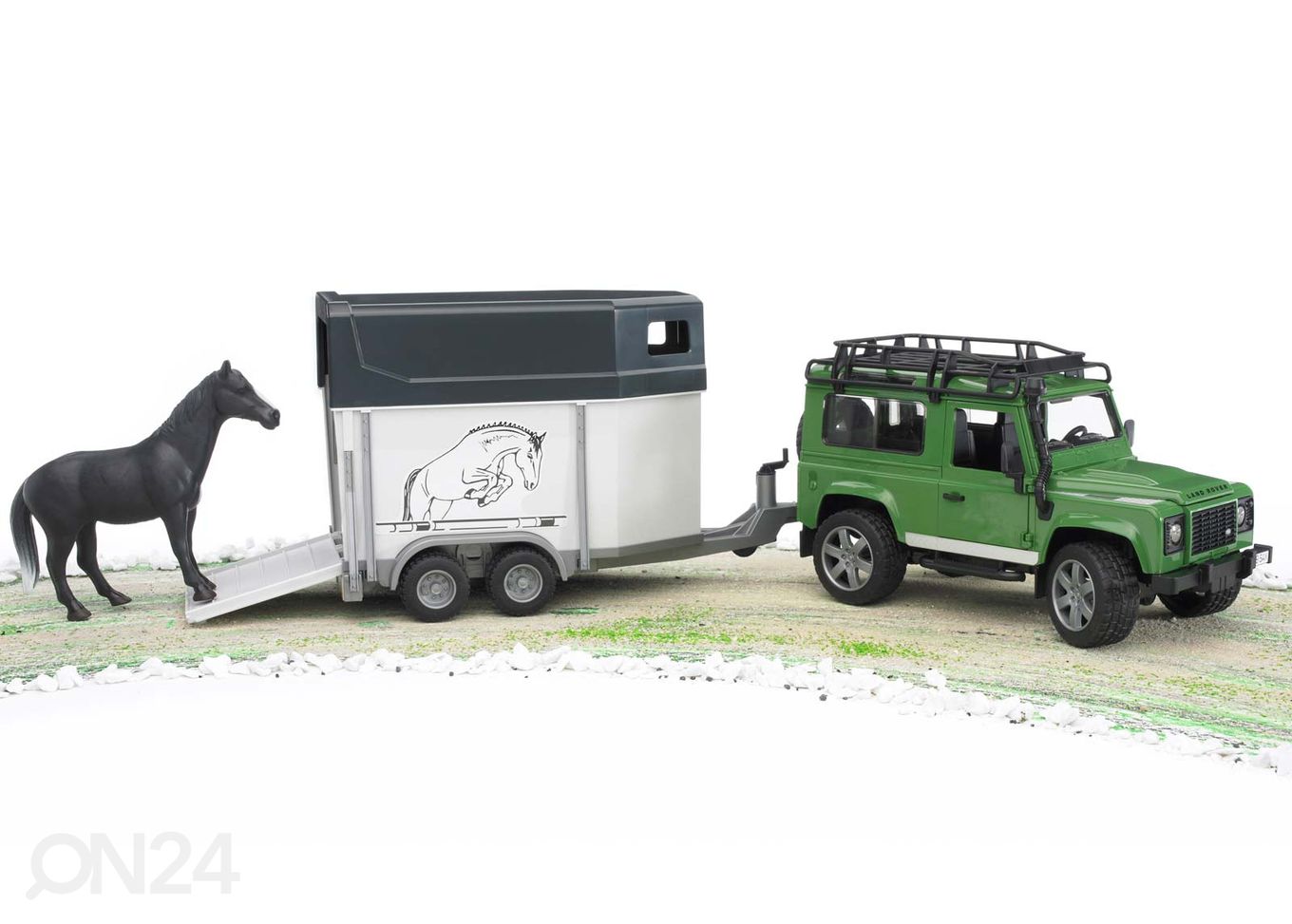 Land Rover Maastikuauto koos hobusetreileriga suurendatud