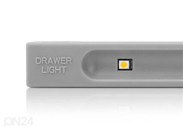 Vibratsioonianduriga valgusti