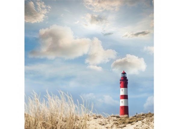 Fliis fototapeet Lighthouse in the dunes