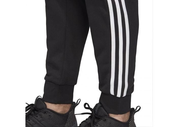 Meeste dressipüksid Adidas Essentials 3 Stripes Tapered Pant FT Cuffed M suurendatud