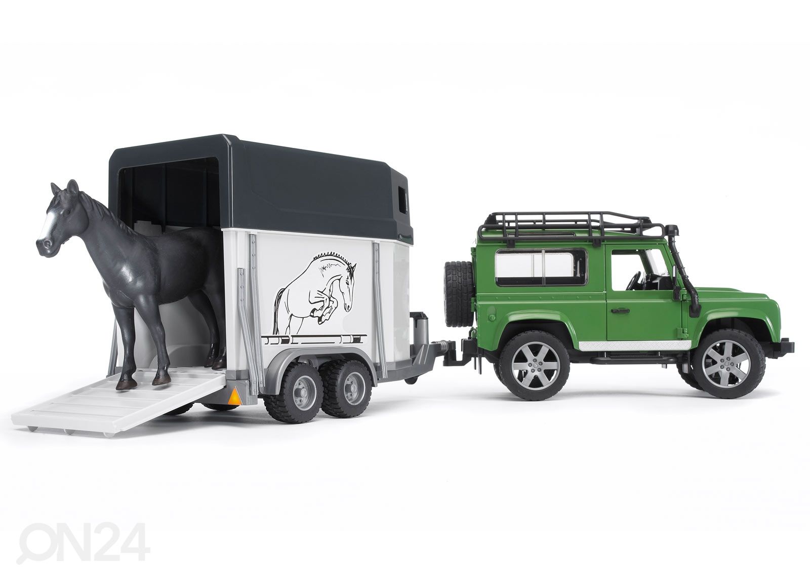 Land Rover Maastikuauto koos hobusetreileriga suurendatud